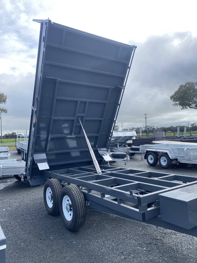 Tipper trailer with hydraulic lift mechanism.