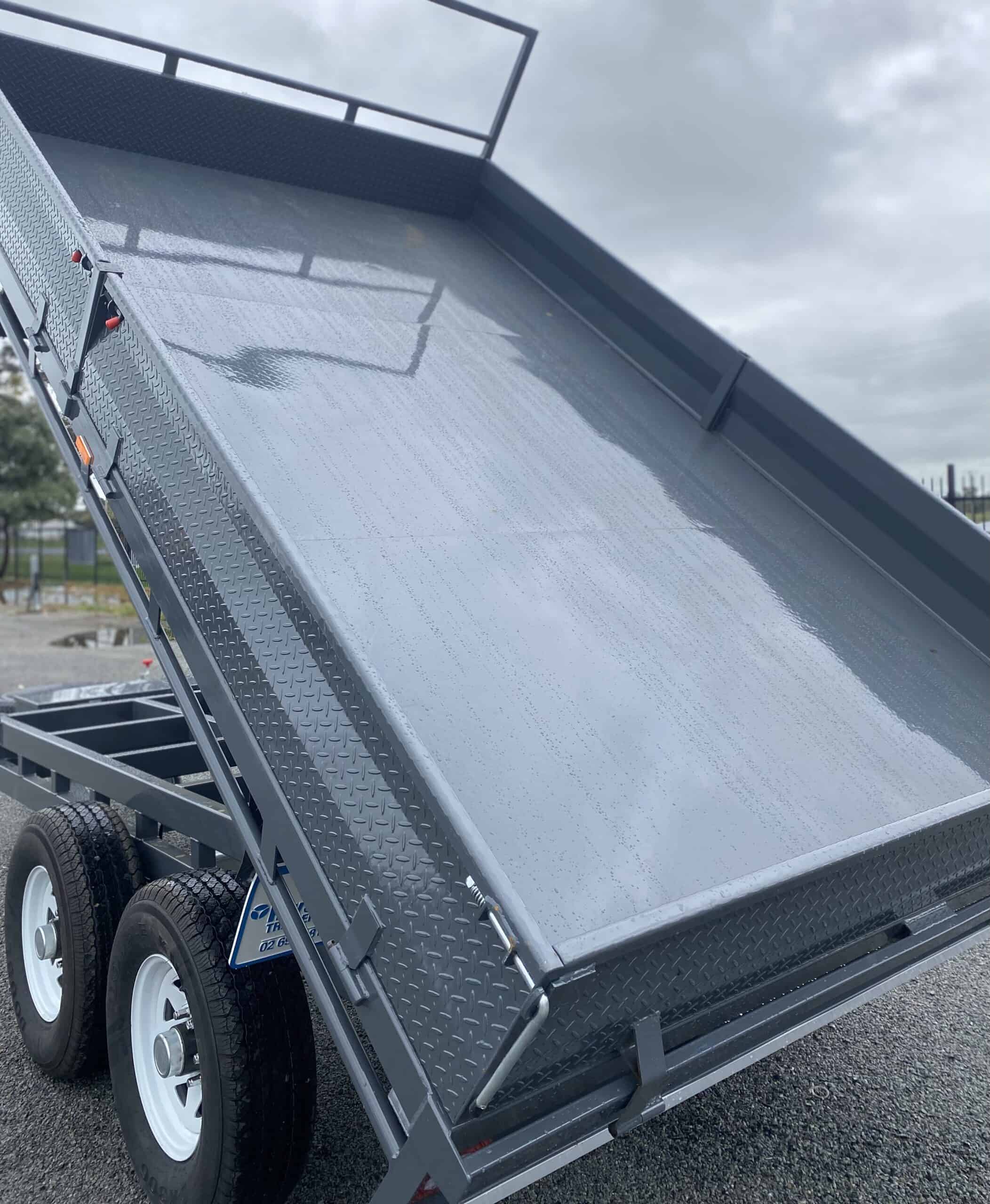 Grey tipping trailer close-up view